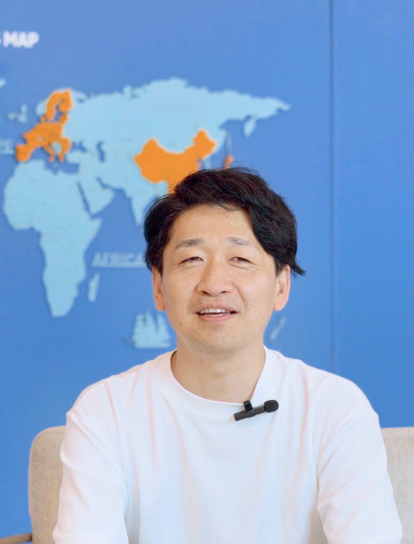 Mr. Sugiura,Production Director of Comnico